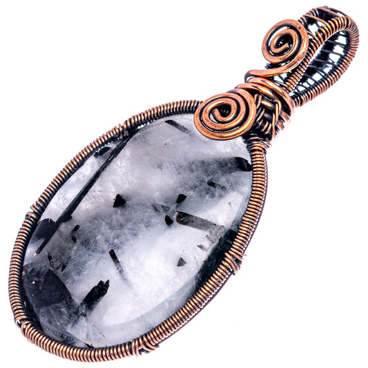 Teardrop quartz pendant in oxidized copper wire wrap with black tourmaline inclusions