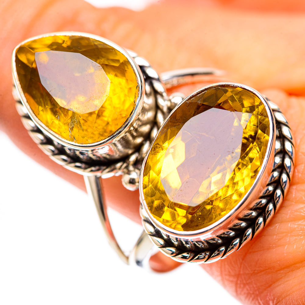 Sterling silver double band ring with faceted oval citrine stones, ornate bezels