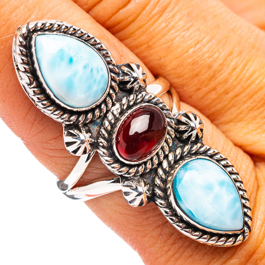 Vintage-style sterling silver ring with two blue teardrop stones and red oval stone