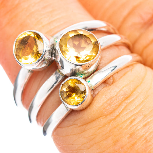 Sterling silver citrine ring with three round yellow stones, scalloped settings