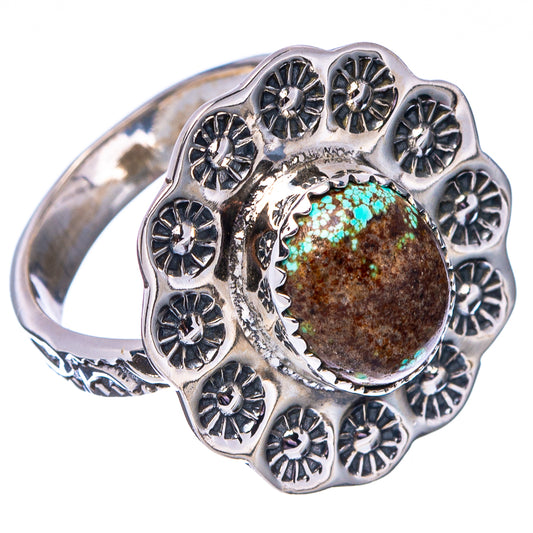 Sterling silver adjustable ring with round turquoise cabochon and engraved flower settings