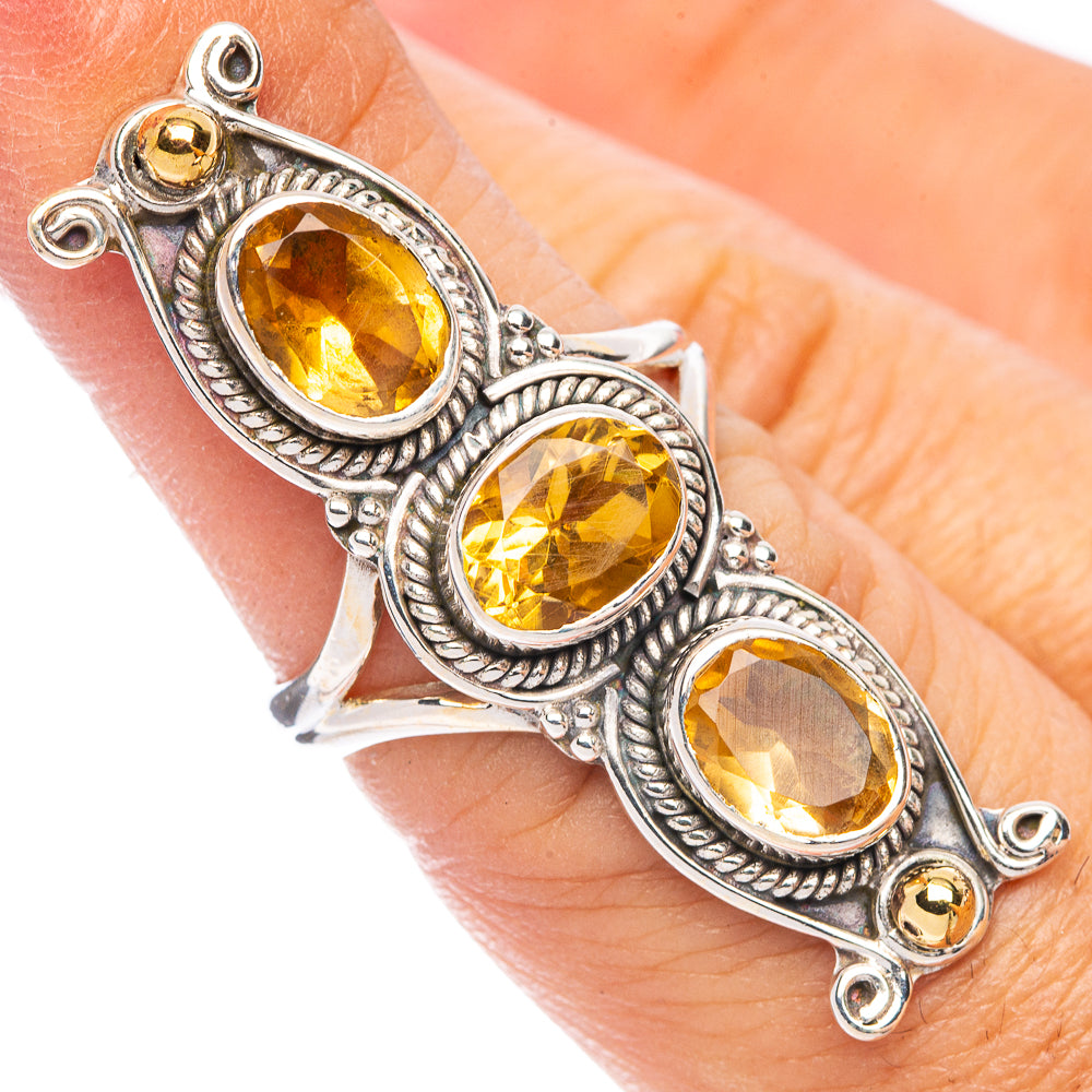 Faceted citrine gemstone ring in sterling silver with three oval settings