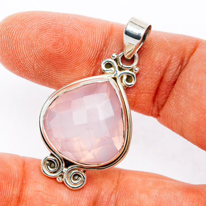 Sterling silver rose quartz pendant with pink faceted teardrop stone and ornate frame