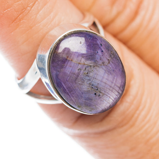 Oval purple gemstone sterling silver ring with bezel setting