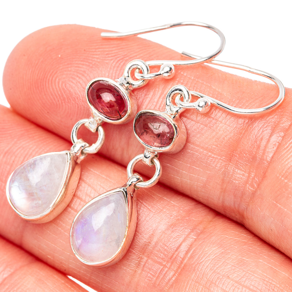 Sterling silver drop earrings with pink oval stones and iridescent teardrop pendants