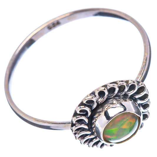 Sterling silver opal ring with raised scalloped bezel and rainbow oval opal
