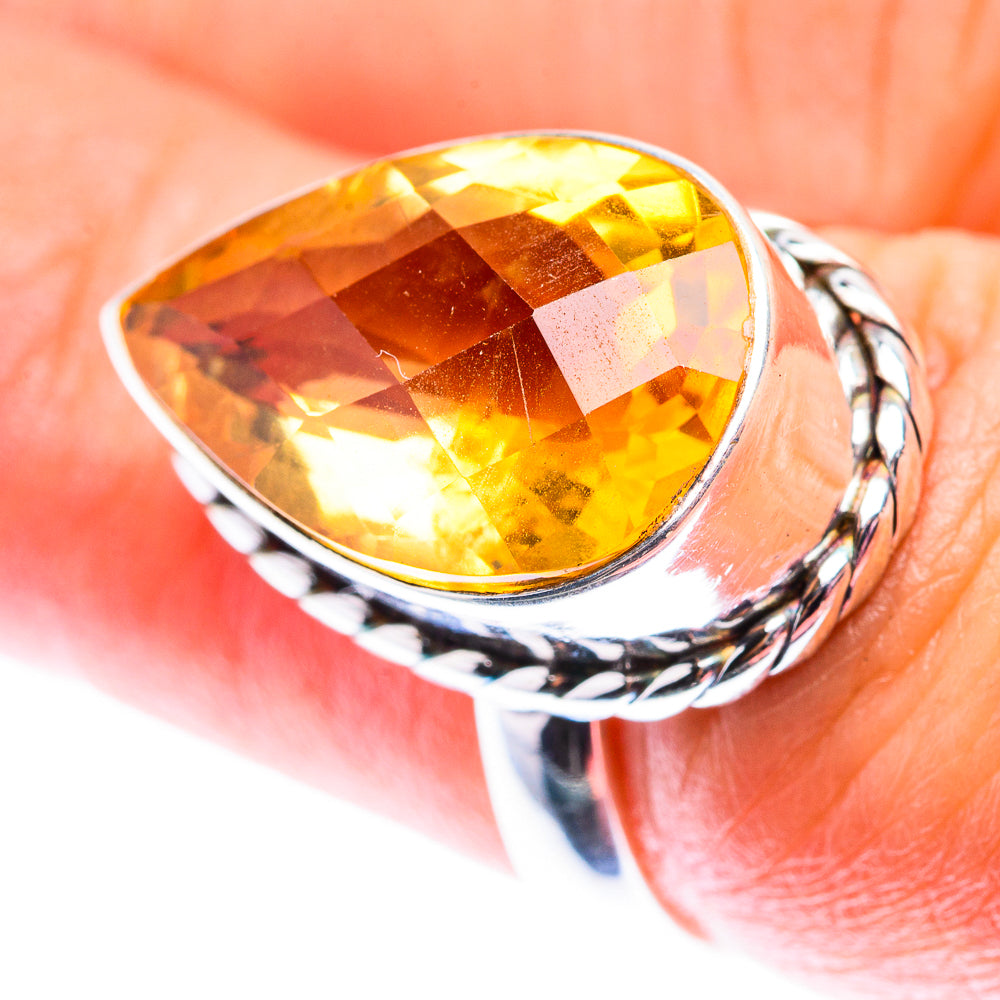 Oval faceted citrine gemstone sterling silver ring with braided rope-style band