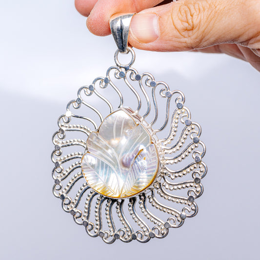 Mother of pearl pendant, .925 sterling silver with ornate filigree and oval shell cabochon