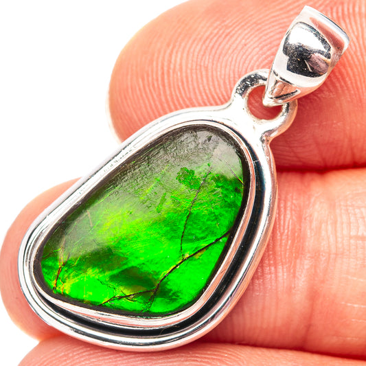 Sterling silver ammolite pendant with oval teardrop green stone and loop bail