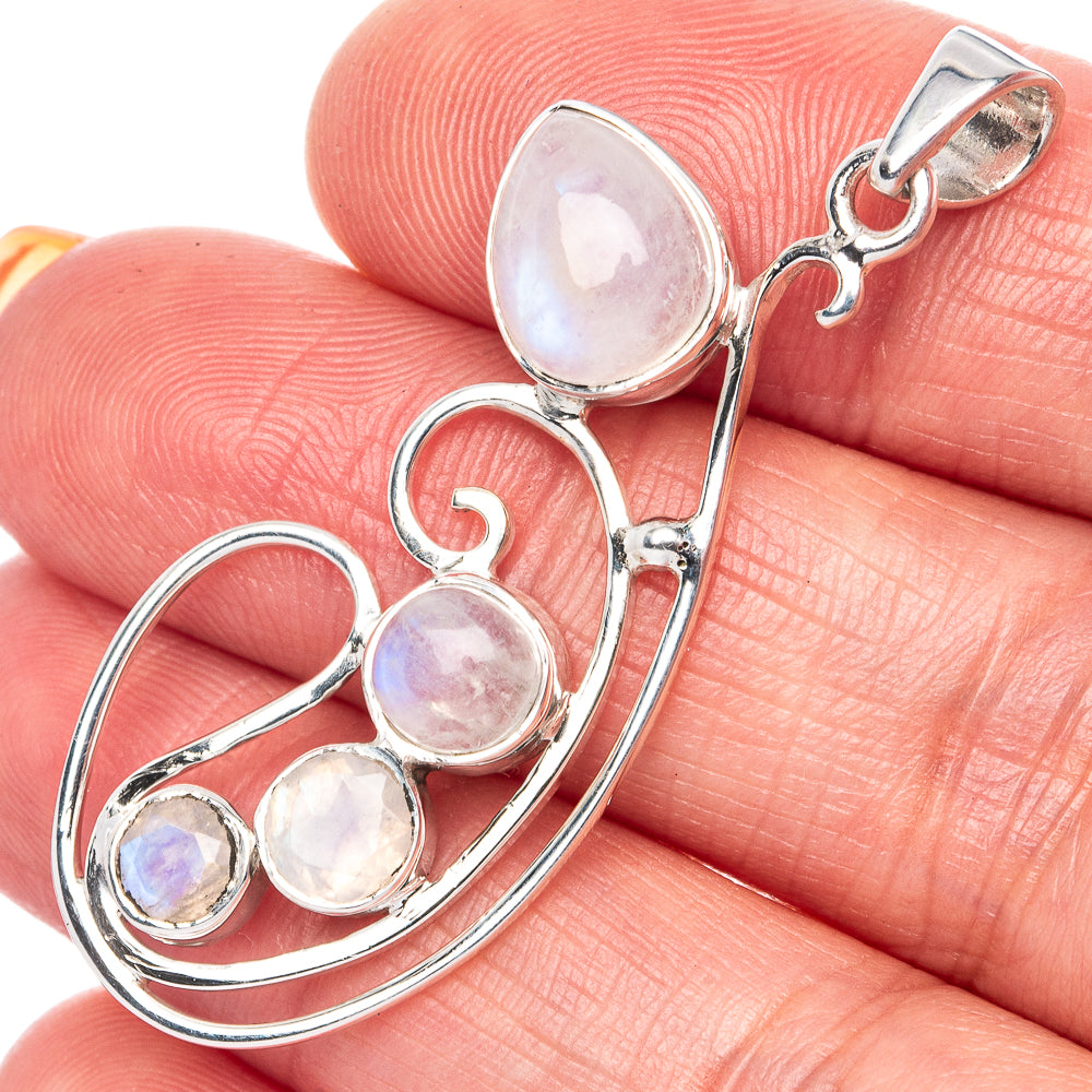 Sterling silver rainbow moonstone pendant with oval and round cabochons, top loop