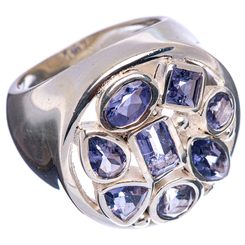 Sterling silver ring with faceted blue-purple stones in raised cluster setting