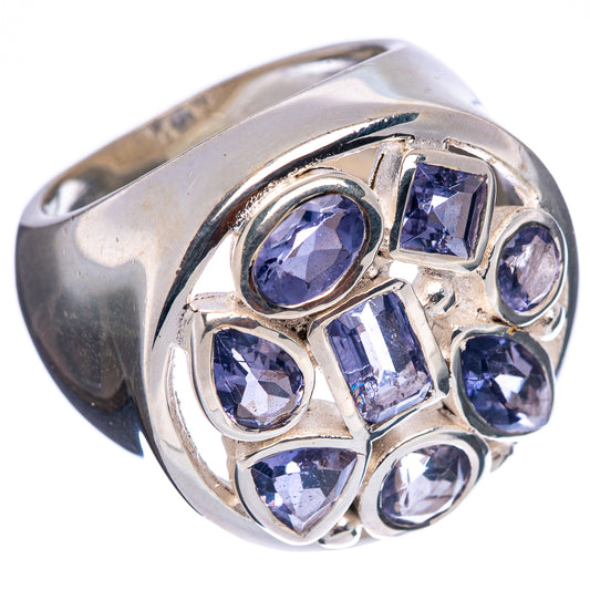 Sterling silver ring with faceted blue-purple stones in raised cluster setting