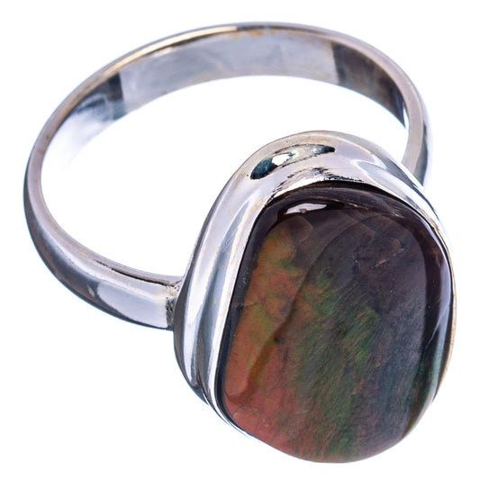 Oval dark ammolite cabochon set in polished sterling silver ring, side view