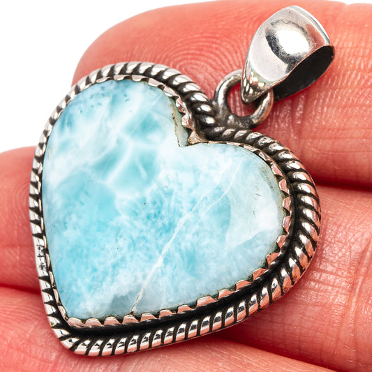 Heart-shaped larimar pendant, .925 sterling silver braided bezel and bail, close-up
