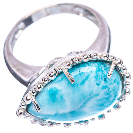 Sterling silver larimar ring with oval light blue stone in prong and beaded setting