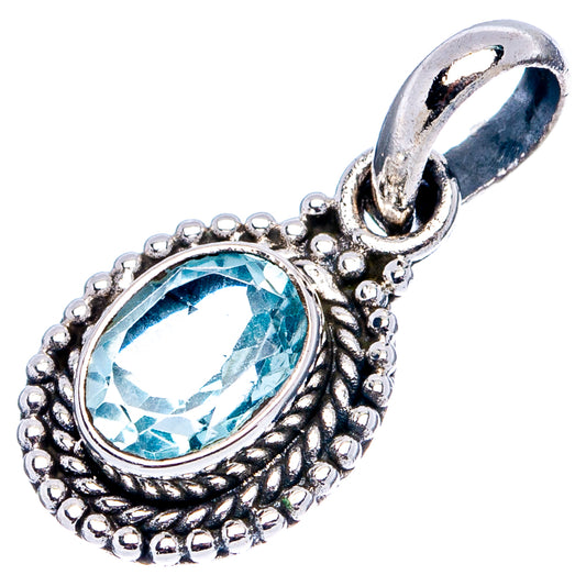 Sterling silver blue topaz pendant with oval bezel and detailed beadwork, open bail