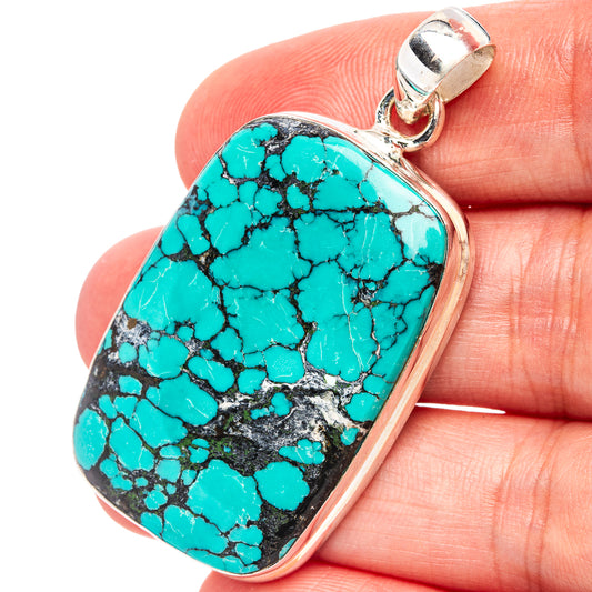 Turquoise stone pendant with silver bezel and loop bail, rectangular gemstone