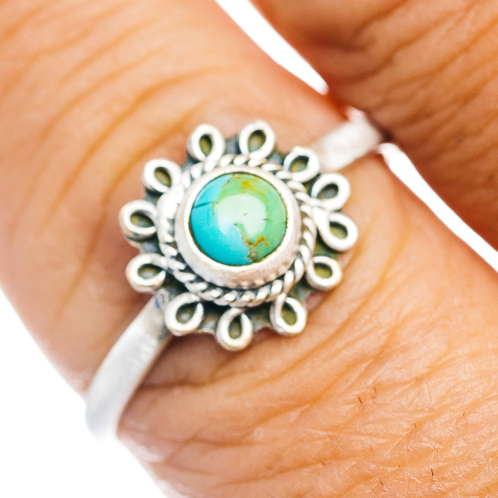 Turquoise inlay sterling silver ring with ornate sunburst bezel