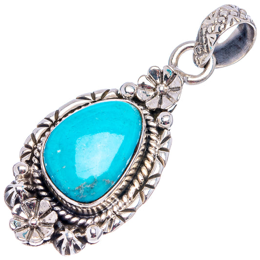Turquoise teardrop pendant with .925 sterling silver floral details and ring bail, side view