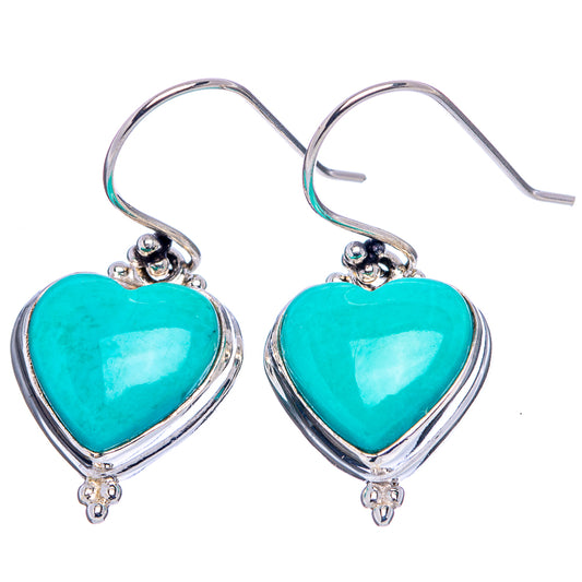 Turquoise heart drop earrings in .925 sterling silver with heart stones and tiny dangles.