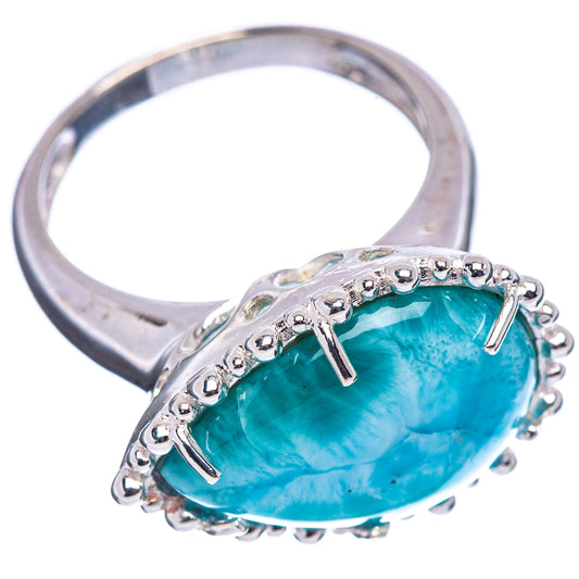 Sterling silver Larimar ring with oval turquoise-blue stone, prong posts and beaded edge