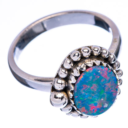 Synthetic opal ring in 925 sterling silver, round blue-green-red center with bead detail