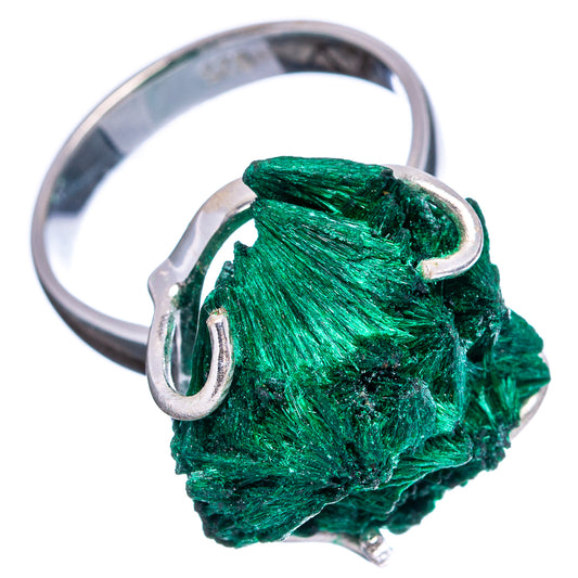 Raw malachite ring featuring an emerald-green raw stone in a .925 sterling silver setting