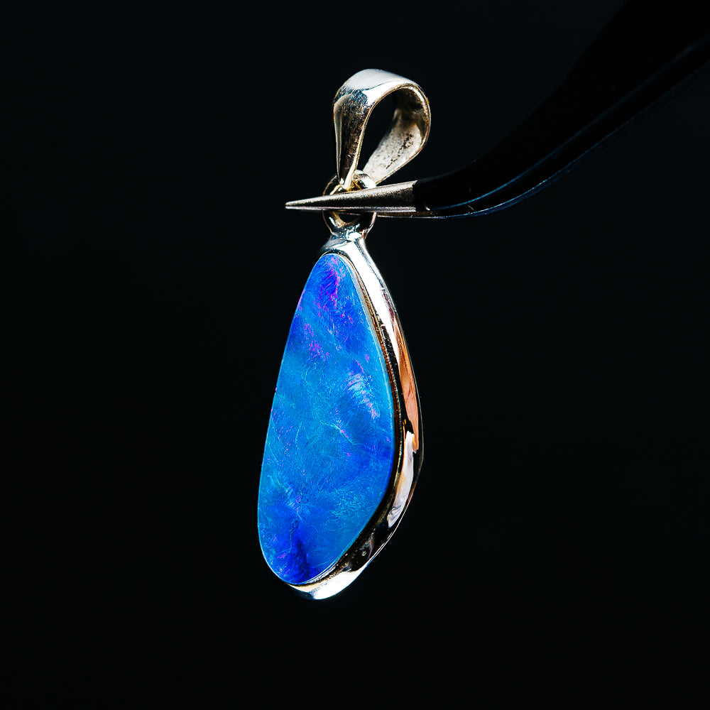 Sterling silver fire opal pendant with teardrop blue opal, polished open setting