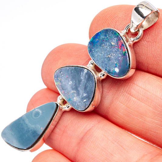 Sterling silver opal doublet pendant with three oval blue stones and loop bail