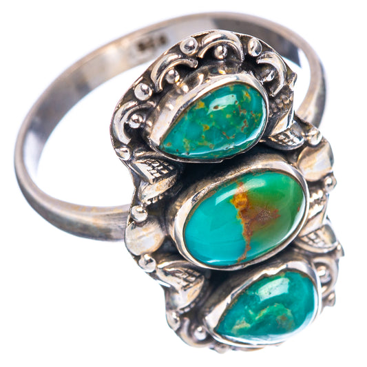 Silver adjustable turquoise ring with oval cabochon stones, side view on band