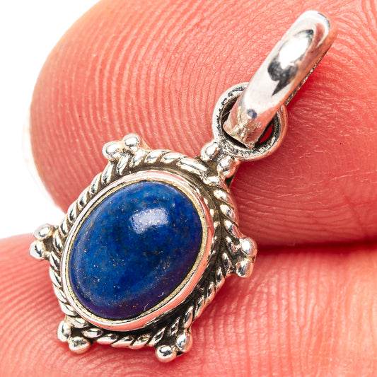 Oval lapis lazuli pendant in .925 sterling silver, ornate bezel with top loop