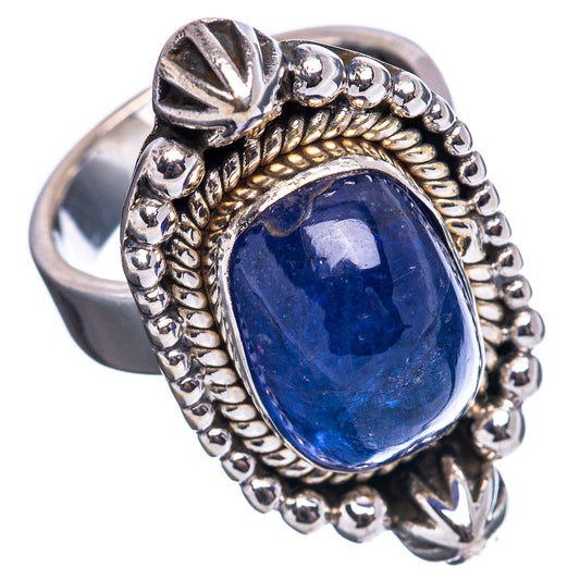 Oval blue gemstone ring with raised bezel and beadwork border, sterling silver