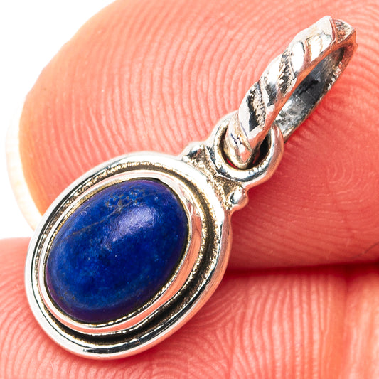 Lapis lazuli pendant with oval blue cabochon in .925 sterling silver setting