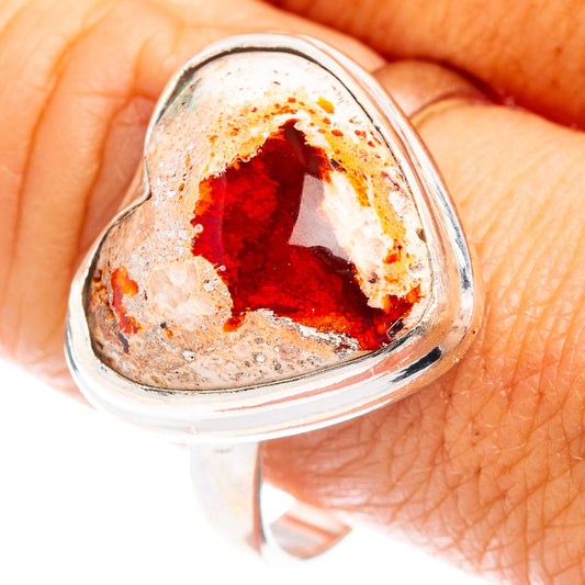 Heart-shaped fire opal cabochon ring in .925 sterling silver, red and orange tones