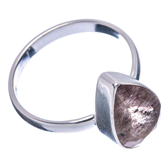 Sterling silver ring with angled teardrop cabochon gemstone, side view