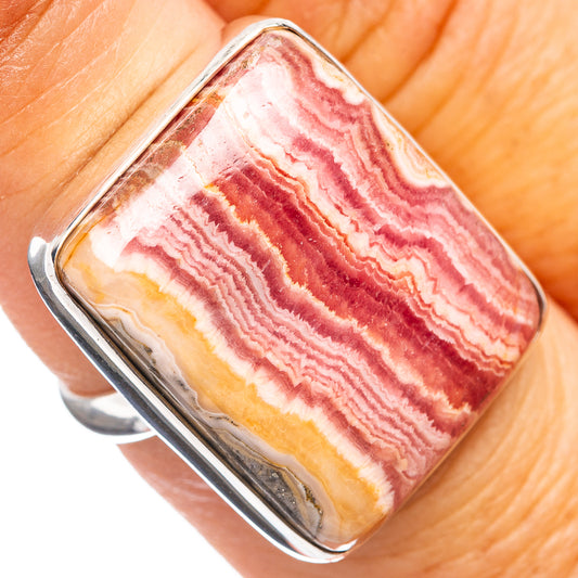 Rhodochrosite ring with pink, white, and gold striped stone in .925 sterling silver bezel