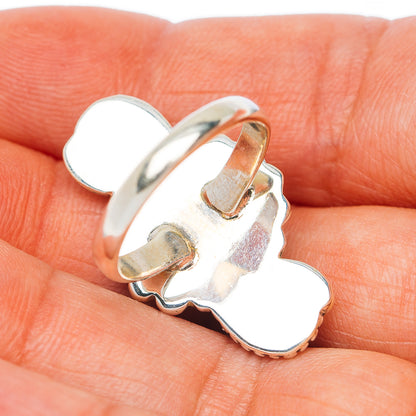 Sterling silver moonstone ring, open-back setting with three oval stone bezels