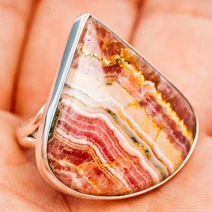 Sterling silver ring with teardrop rhodochrosite cabochon, red-pink and amber bands
