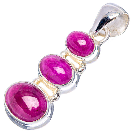 Three-stone oval ruby pendant with .925 sterling silver settings and purple gemstones