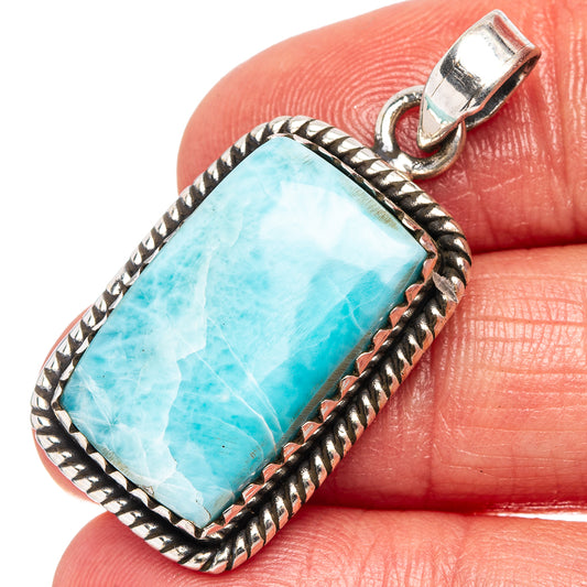 Sterling silver pendant with rectangular light-blue larimar stone and twisted rope bezel