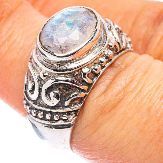 Sterling silver filigree ring with oval iridescent moonstone, ornate band