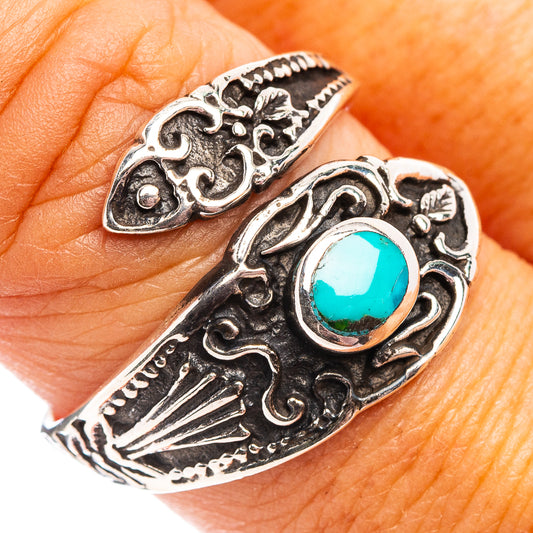 Turquoise inlaid sterling silver ring with ornate etched leaf and swirl details