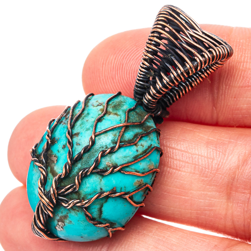 Oxidized copper wire-wrapped turquoise tree of life pendant, close-up detail