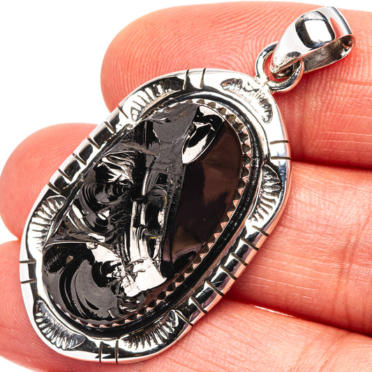 Oval shungite pendant with glossy black stone set in .925 sterling silver frame
