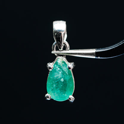 Sterling silver emerald pendant with pear-cut green gem and claw settings