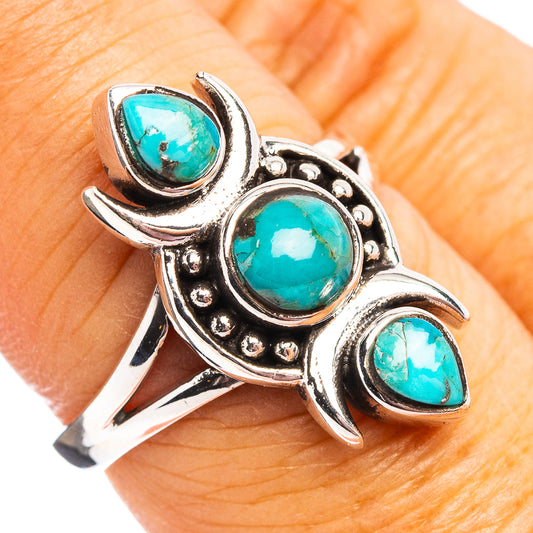 Sterling silver ring with three oval turquoise cabochons, ornate side details