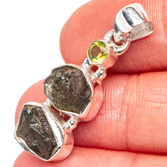 Sterling silver peridot and moldavite pendant with yellow-green gemstone and rough green crystals