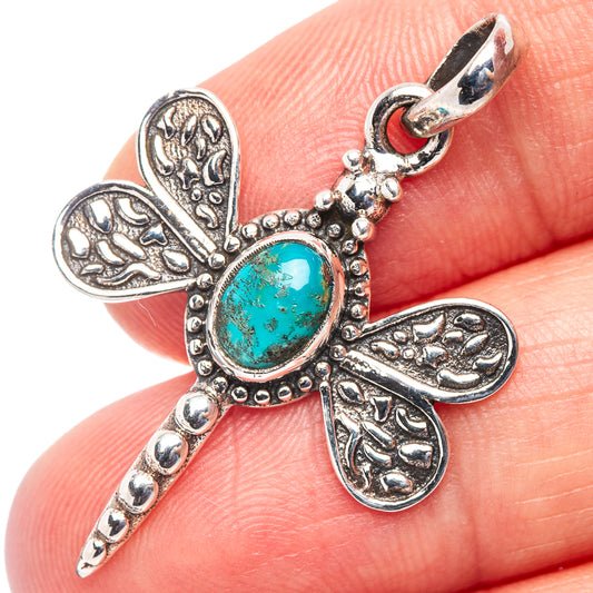 Sterling silver dragonfly pendant with oval turquoise chrysocolla stone and bail, close-up