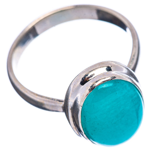 Sterling silver ring with oval turquoise gemstone, side view of band.