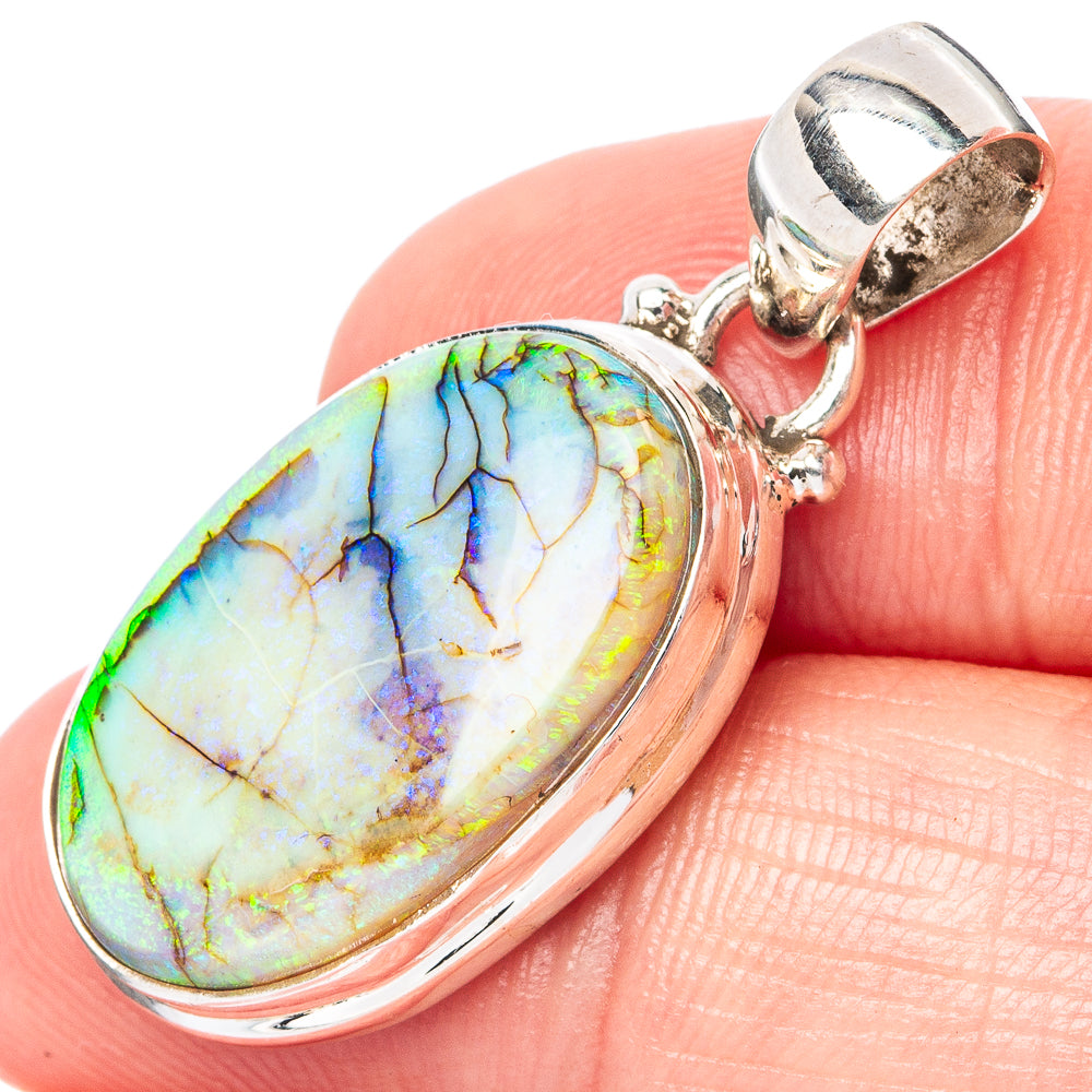 Sterling silver opal pendant with oval multicolor cabochon and hinged bail